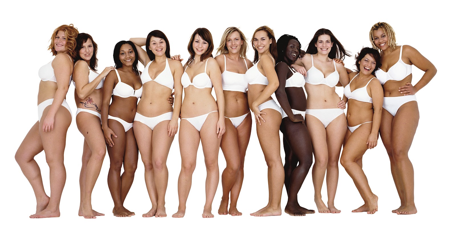 Image from Dove's Real Beauty Campaign. Unconventional models of various body types, ages, and races stand, smiling, against a white background