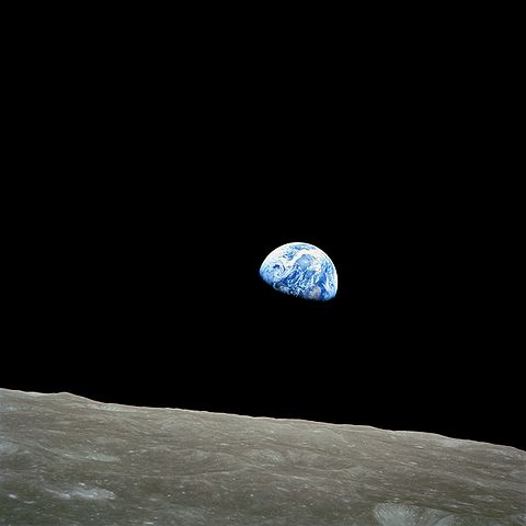 Earth rises over moon