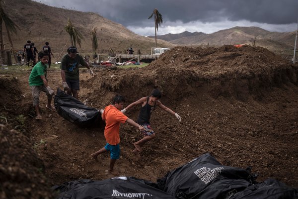 Tacloban mass grave NYTimes