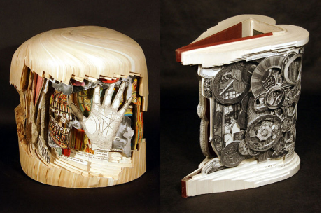 Two books that have been carved into scupltures