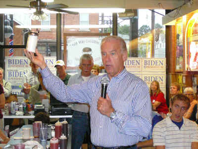 Strange looking Biden waving sugar jar