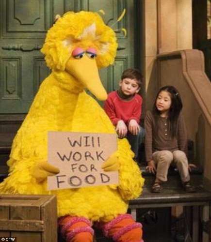 Big Bird holds sign "will work for food"