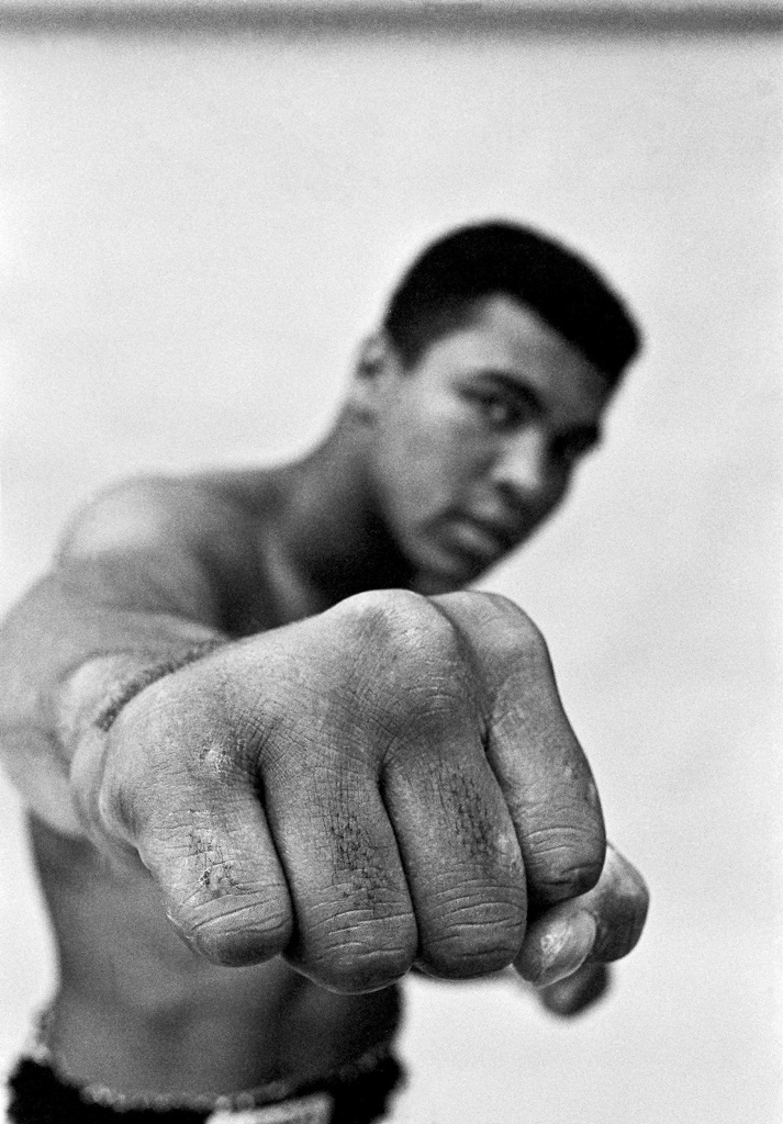 A photographic portrait of Muhammad Ali highlighting his right fist.