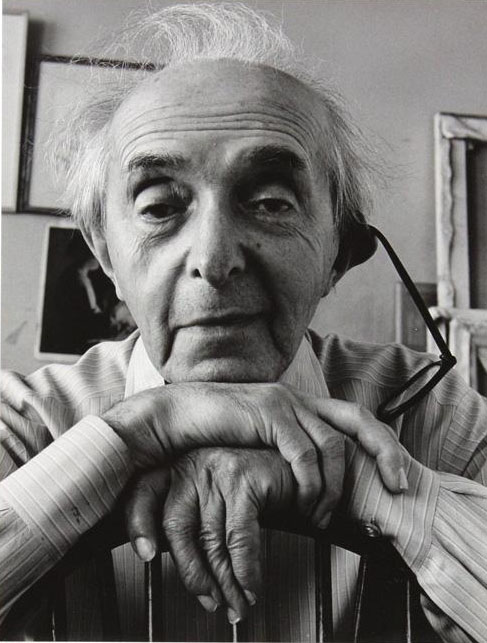 A photographic portrait of Raphael Soyer.