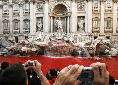 The Trevi Fountain in Rome after Graziano Cecchini poured red dye into it
