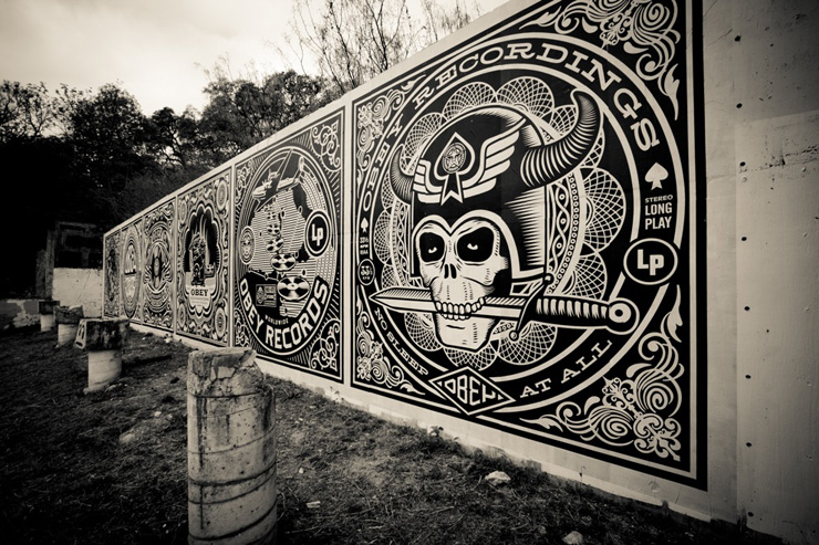 A photograph of Shepherd Fairey's inaugural designs on the HOPE Outdoor Gallery in Austin.