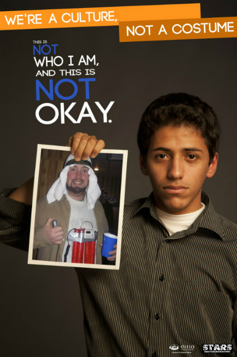 STARS: Arab-American student holding a picture of a person dressed as a Muslim terrorist