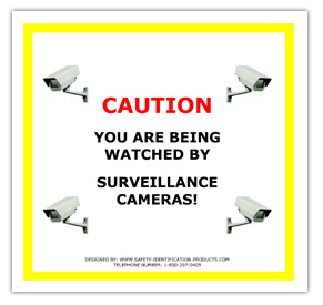 A sign that reads Caution you are being watched by surveillance cameras!
