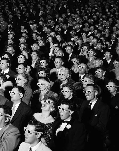 old photo of theater audience in 3D glasses