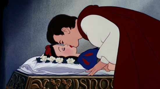Snow White, in a dress of blue and red, is kissed by her prince charming.