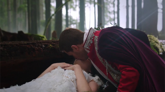 A live-action version of Snow White is kissed by her suitor. Her dress is white and frilly. Oh so very frilly. Like, all the frills.
