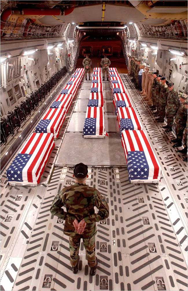 Flag-draped coffins returning from Iraq