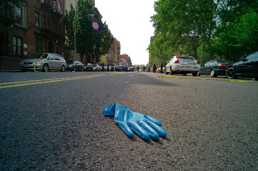 Blue glove left in the street