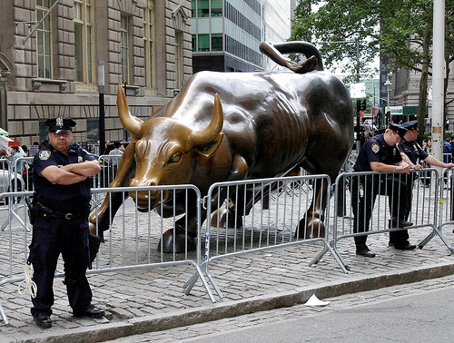 Police guarding the Charging Bull