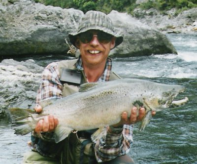 angler posing with large trout