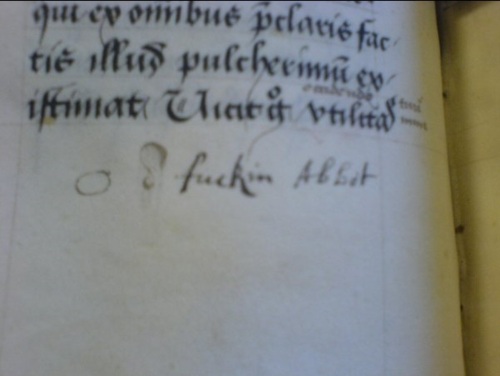 Picture of a medieval manuscript where written in the bottom margin is 'O d fuckin Abbot'