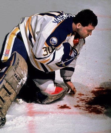 Buffalo Sabre player Malarchuk suffers a severe injury to his jugular vein on the ice.
