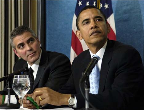 A photograph of President Obama and George Clooney.