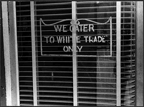 sign: we cater to white trade only