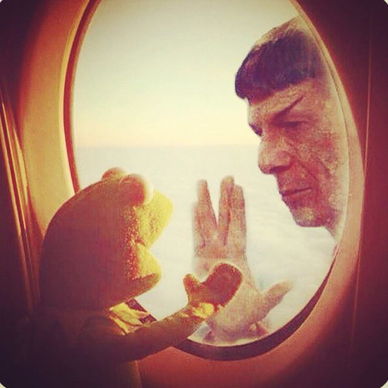 Leonard Nimoy and Kirmit place their hands to opposite sides of a sci-fi window, in a recreation of a scene from Star Trek II: The Wrath of Khan