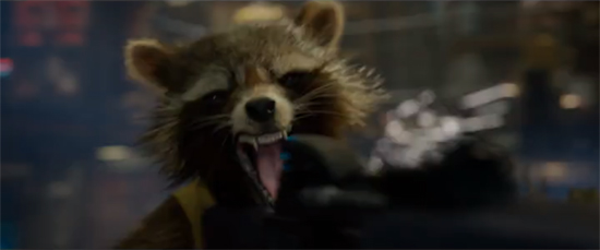 Rocket Raccoon screams as he shoots a giant gun.